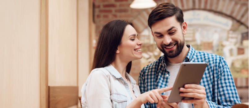 young couple on checking tab