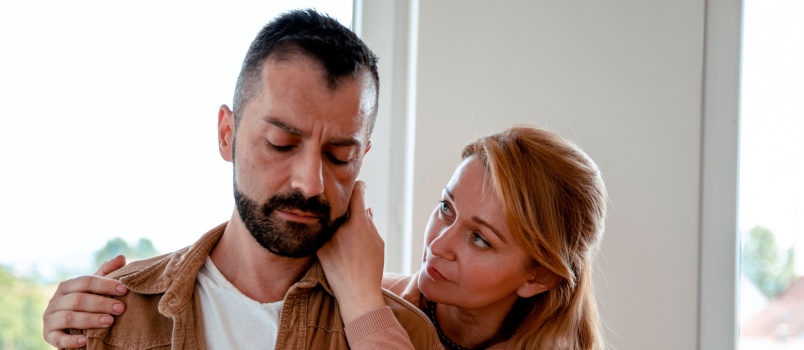 Wife consoling her husband