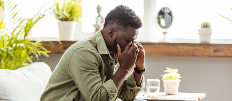 Stressed young african man