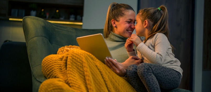 Mother and daughter sharing affection