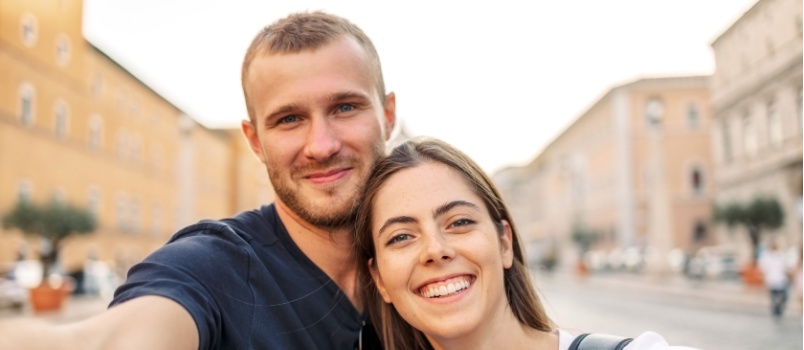 Young couple taking selfie