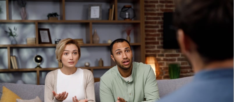 Young couple having conflicts infront of therapist