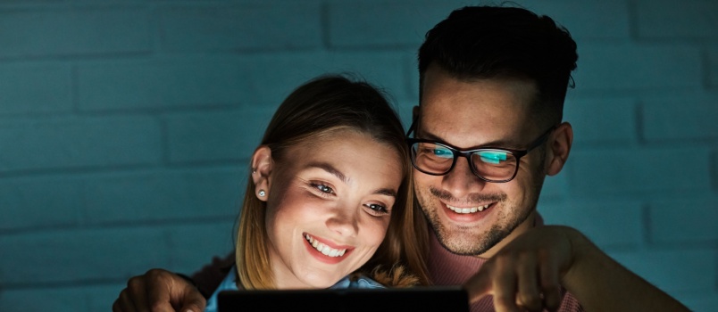Young couple using tablet