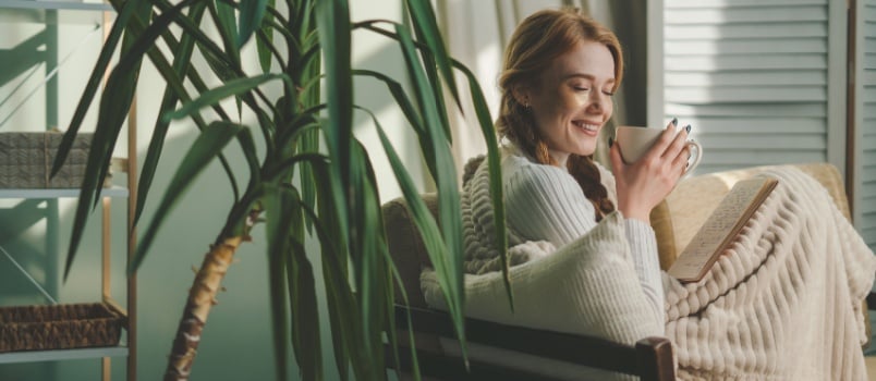Woman sipping morning coffee