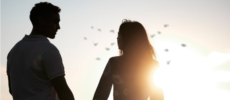 Couple holding hands