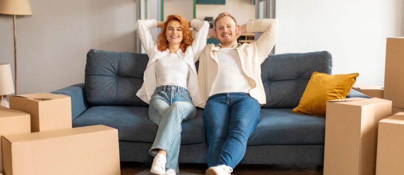 Couple laying resting on couch