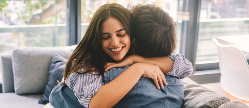 Young couple hugging each other