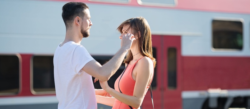 Couple saying goodbye to each other