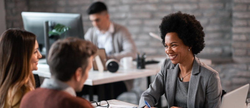 Couple consulting with financial advisor
