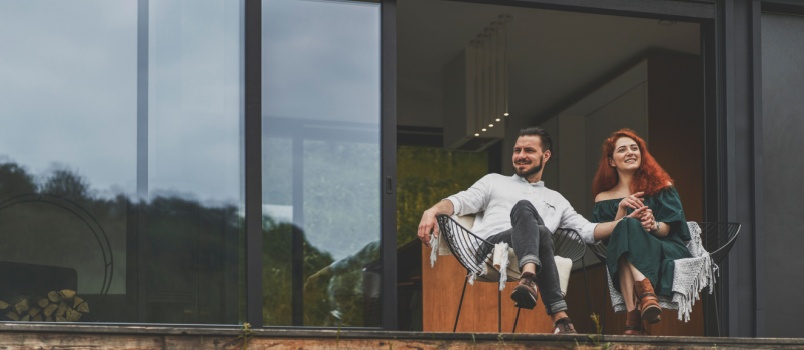 Happy couple sitting outdoor