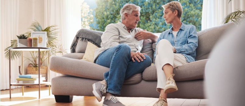 Senor couple talking to each other