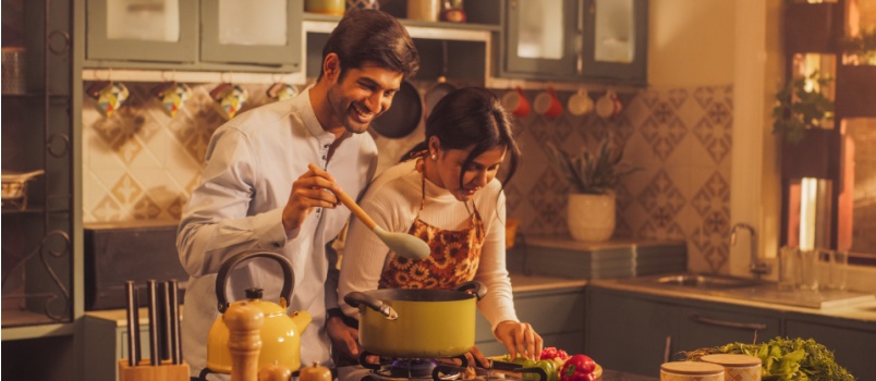Happy couple cooking together