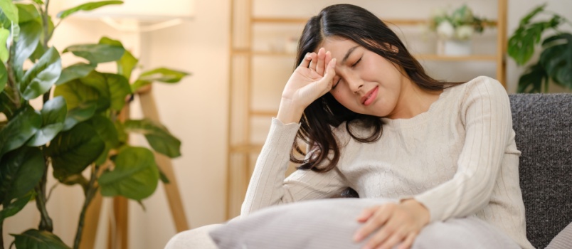 Woman sitting on a couch