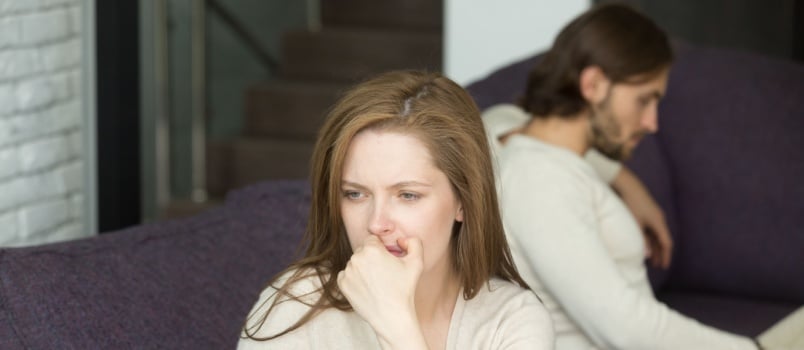 Sad disappointed wife ignoring man