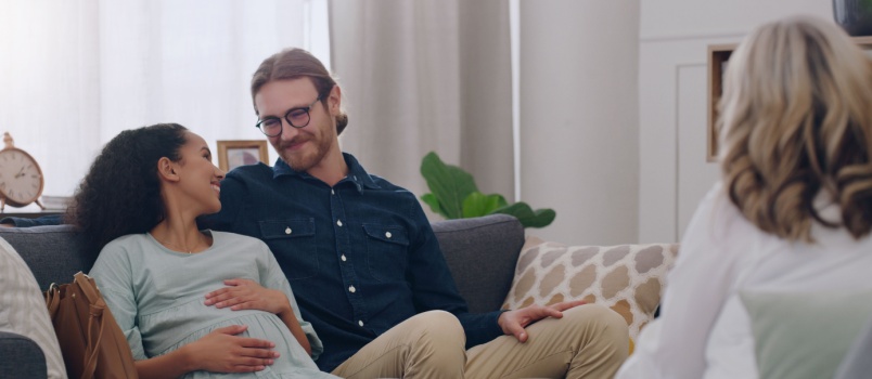 Smiling couple taking therapy session