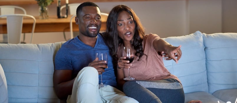 Young couple enjoying movie