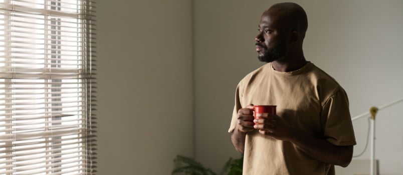 Man looking at window