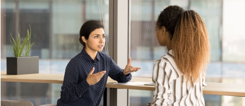 Colleague having discussion