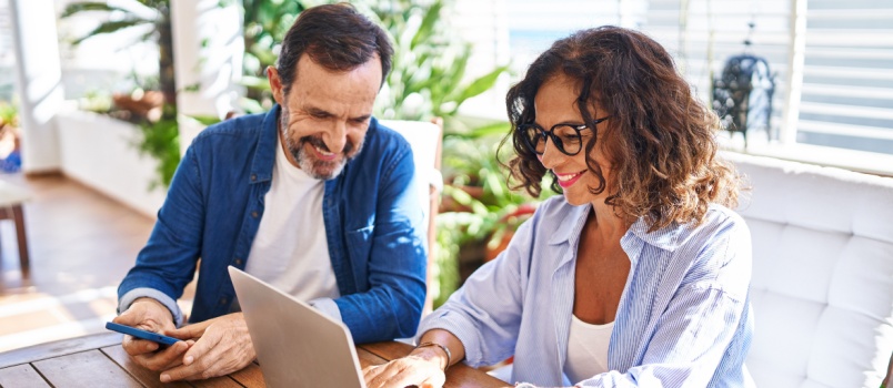 young couple using laptop