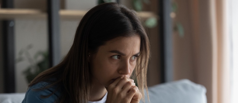 Thoughtful woman looking depressed