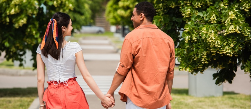 Couple holding hands