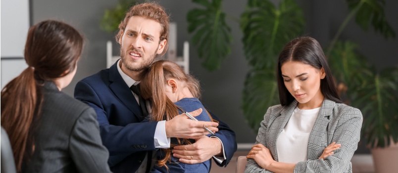Young couple visiting daughter after divorce