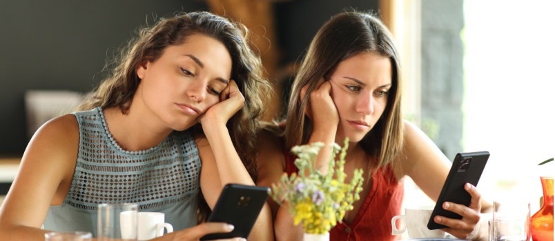 Woman being busy in using smartphone