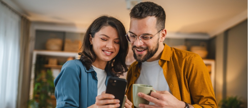 Couple using smartphone