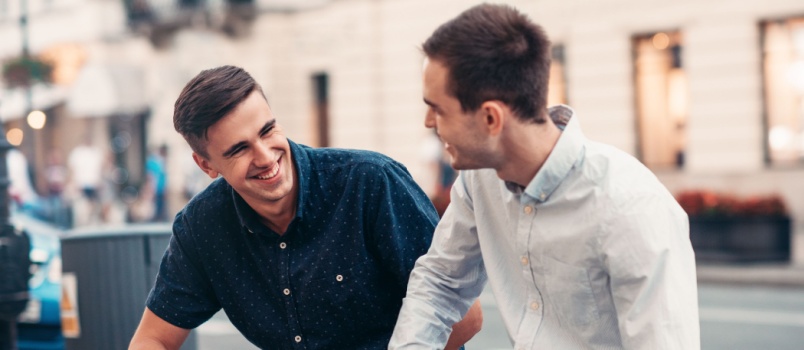 Friends having happy conversation