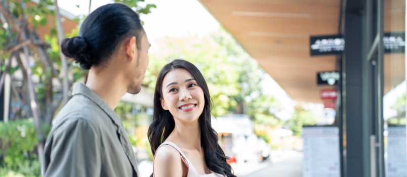 Young man and woman doing shopping