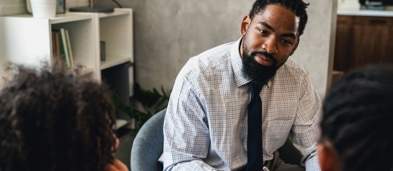 Young teen talking to psychologist