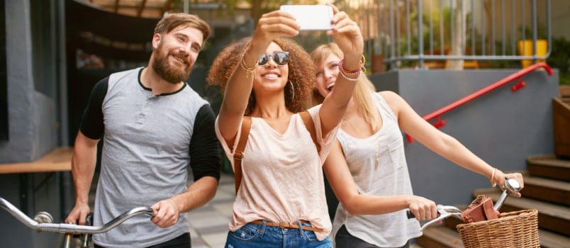 People taking selfie