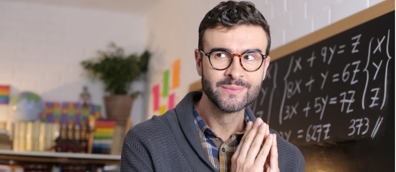 Professor planning something in classroom