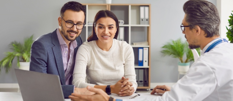 Young couple visiting doctor