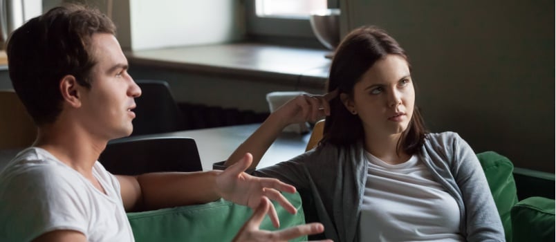 annoyed girl listening to her boyfriend