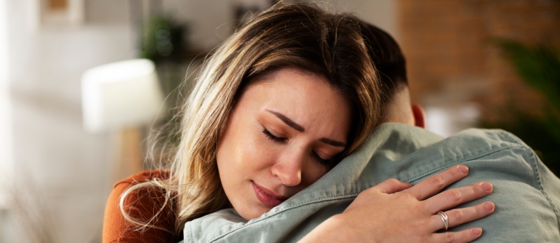 Young couple hugging each other
