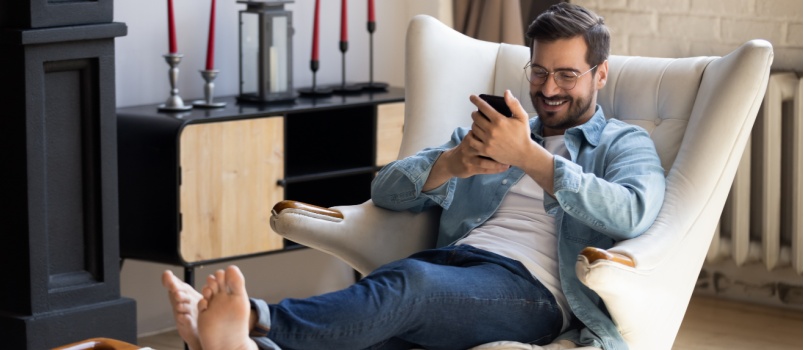 Man relaxing sitting on chair