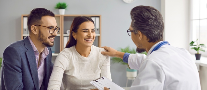 Young couple meeting doctor