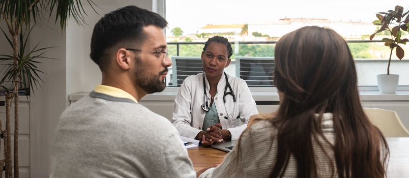 Married couple visiting doctor