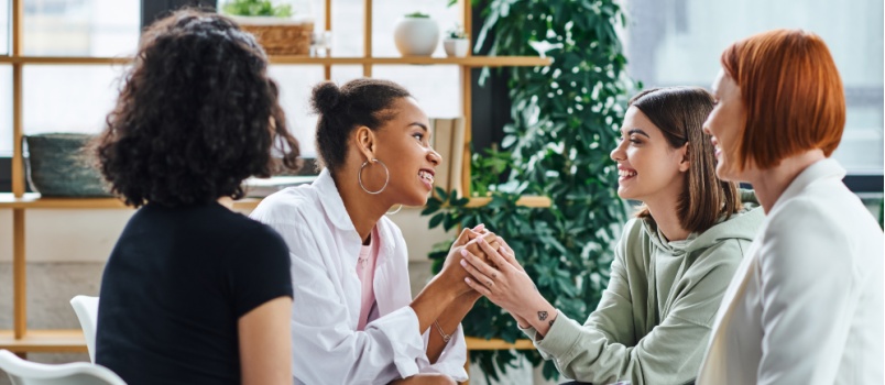 Young woman holding hands