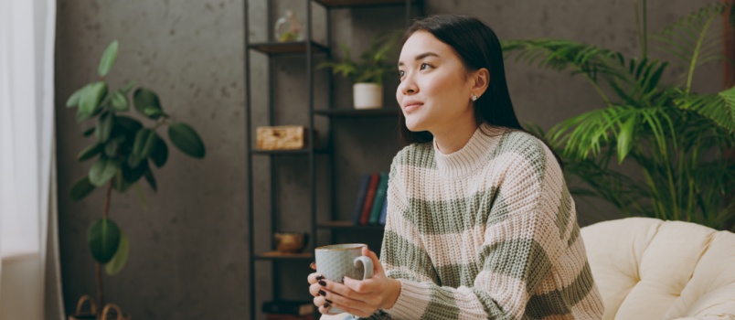 Young woman having coffee