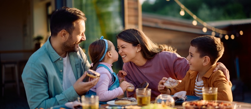 Happy family having fun  while eating