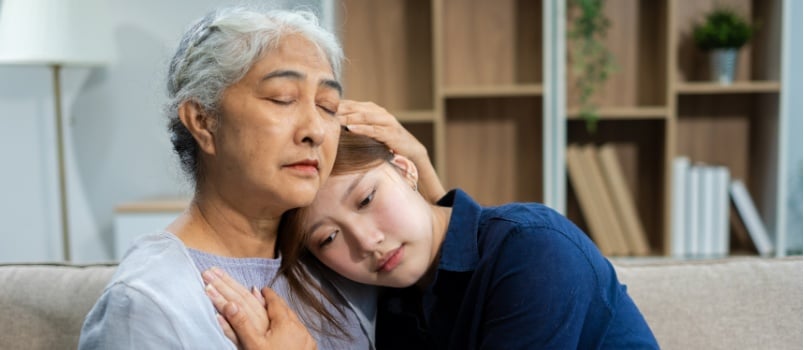 Woman hugging her grandmother