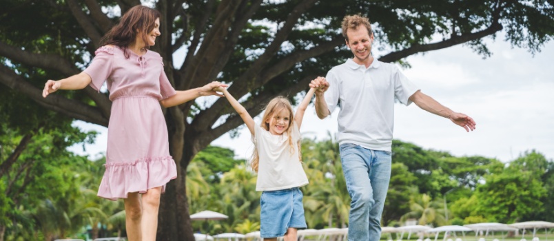 Young family having picnic