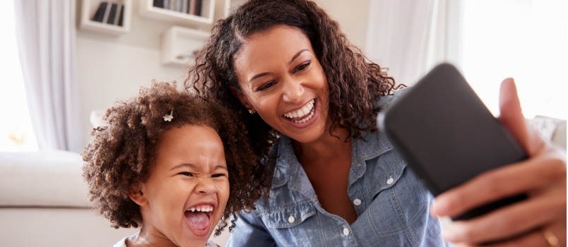 Mom and daughter taking selfie