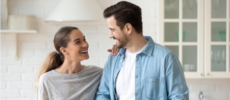 Loving couple looking at each other smiling