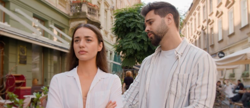 Man saying sorry to woman