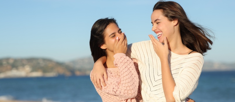 Two best friend laughing while talking