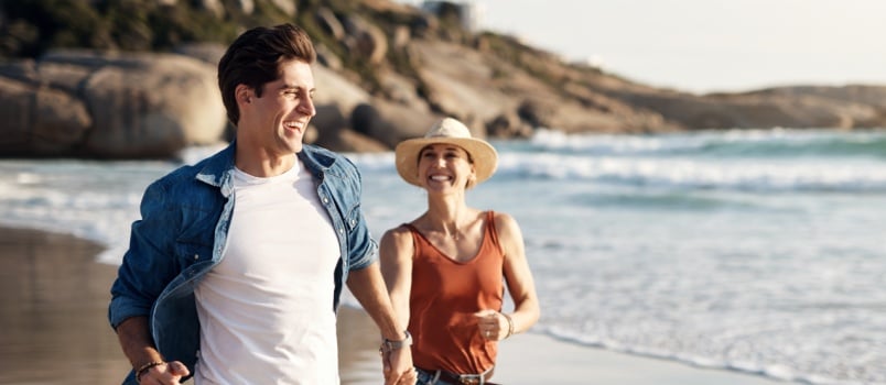 Couple walking on beach