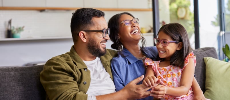 Happy family sitting together